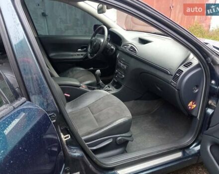 Синий Рено Лагуна, объемом двигателя 2.02 л и пробегом 268 тыс. км за 4700 $, фото 4 на Automoto.ua