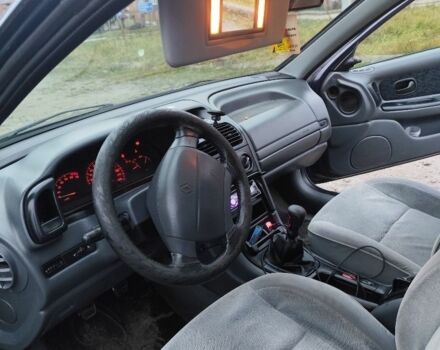 Синій Рено Лагуна, об'ємом двигуна 1.8 л та пробігом 270 тис. км за 1900 $, фото 4 на Automoto.ua