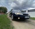 Синий Рено Лагуна, объемом двигателя 1.8 л и пробегом 243 тыс. км за 2100 $, фото 1 на Automoto.ua