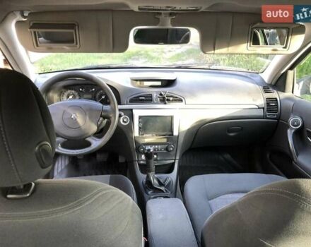 Синий Рено Лагуна, объемом двигателя 2 л и пробегом 290 тыс. км за 4300 $, фото 2 на Automoto.ua