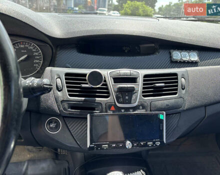 Синій Рено Лагуна, об'ємом двигуна 2 л та пробігом 321 тис. км за 5999 $, фото 1 на Automoto.ua