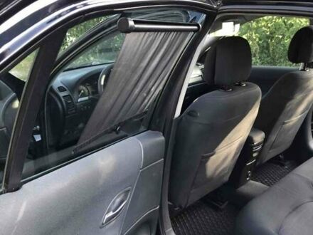 Синий Рено Лагуна, объемом двигателя 2 л и пробегом 290 тыс. км за 4300 $, фото 1 на Automoto.ua