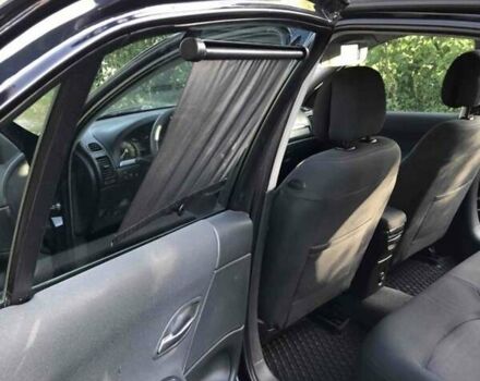 Синий Рено Лагуна, объемом двигателя 2 л и пробегом 290 тыс. км за 4300 $, фото 1 на Automoto.ua