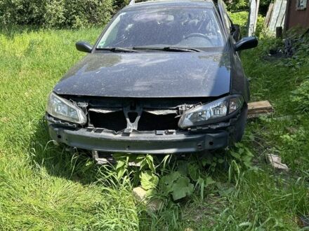 Синій Рено Лагуна, об'ємом двигуна 2 л та пробігом 267 тис. км за 1000 $, фото 1 на Automoto.ua