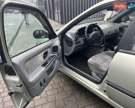 Зелений Рено Лагуна, об'ємом двигуна 2 л та пробігом 381 тис. км за 2350 $, фото 4 на Automoto.ua
