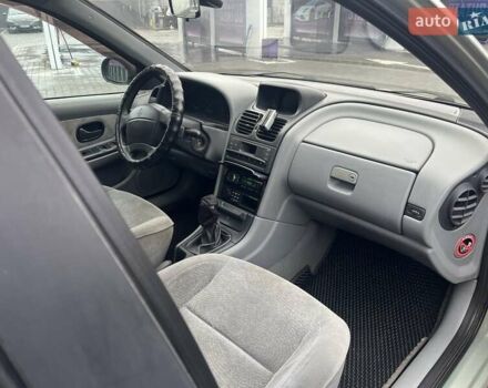 Зелений Рено Лагуна, об'ємом двигуна 2 л та пробігом 381 тис. км за 2350 $, фото 5 на Automoto.ua