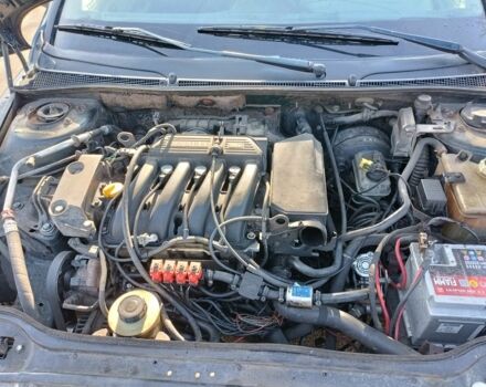 Зеленый Рено Лагуна, объемом двигателя 1.6 л и пробегом 372 тыс. км за 1000 $, фото 7 на Automoto.ua