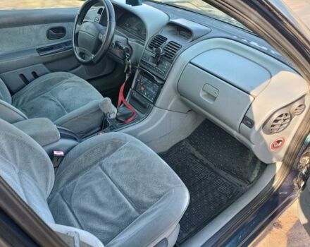 Зеленый Рено Лагуна, объемом двигателя 1.6 л и пробегом 372 тыс. км за 1000 $, фото 12 на Automoto.ua