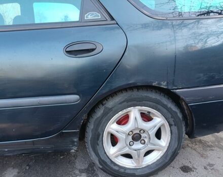 Зеленый Рено Лагуна, объемом двигателя 1.6 л и пробегом 372 тыс. км за 1000 $, фото 5 на Automoto.ua