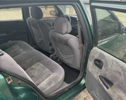 Зеленый Рено Лагуна, объемом двигателя 1.9 л и пробегом 350 тыс. км за 1500 $, фото 4 на Automoto.ua