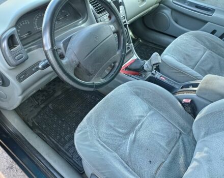 Зеленый Рено Лагуна, объемом двигателя 1.6 л и пробегом 372 тыс. км за 1000 $, фото 15 на Automoto.ua