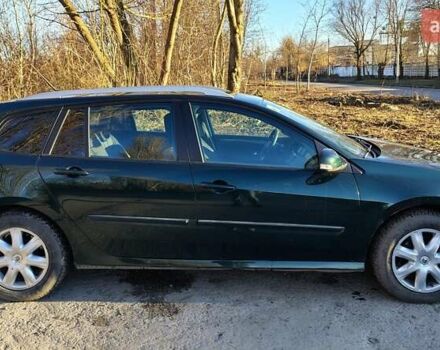 Зеленый Рено Лагуна, объемом двигателя 1.5 л и пробегом 300 тыс. км за 6500 $, фото 6 на Automoto.ua