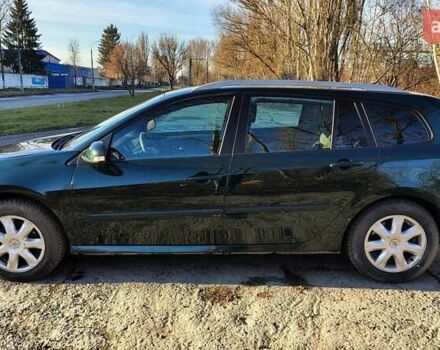 Зеленый Рено Лагуна, объемом двигателя 1.5 л и пробегом 300 тыс. км за 6500 $, фото 5 на Automoto.ua