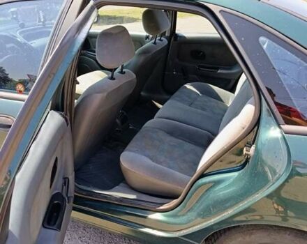 Зелений Рено Лагуна, об'ємом двигуна 2 л та пробігом 325 тис. км за 2400 $, фото 3 на Automoto.ua