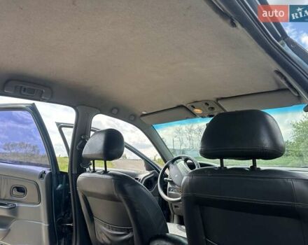 Зелений Рено Лагуна, об'ємом двигуна 2 л та пробігом 226 тис. км за 1750 $, фото 15 на Automoto.ua