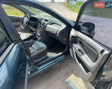 Зелений Рено Лагуна, об'ємом двигуна 2 л та пробігом 226 тис. км за 1750 $, фото 11 на Automoto.ua