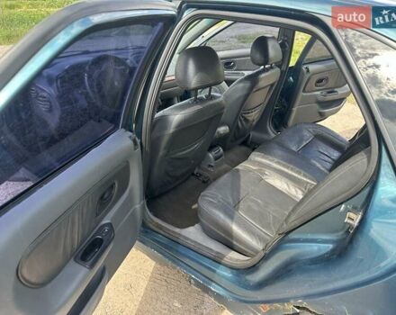 Зелений Рено Лагуна, об'ємом двигуна 2 л та пробігом 226 тис. км за 1750 $, фото 10 на Automoto.ua