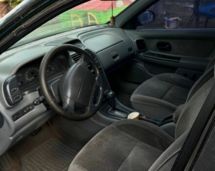 Зеленый Рено Лагуна, объемом двигателя 3 л и пробегом 350 тыс. км за 2200 $, фото 2 на Automoto.ua