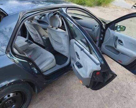 Зеленый Рено Лагуна, объемом двигателя 1.8 л и пробегом 359 тыс. км за 1650 $, фото 6 на Automoto.ua