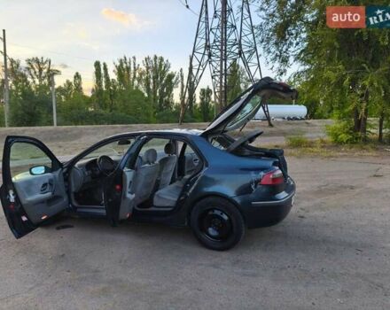 Зеленый Рено Лагуна, объемом двигателя 1.8 л и пробегом 359 тыс. км за 1650 $, фото 4 на Automoto.ua