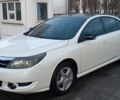 Белый Рено Латитьюд, объемом двигателя 2 л и пробегом 228 тыс. км за 8000 $, фото 1 на Automoto.ua