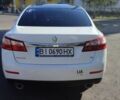 Белый Рено Латитьюд, объемом двигателя 2.5 л и пробегом 219 тыс. км за 7500 $, фото 1 на Automoto.ua