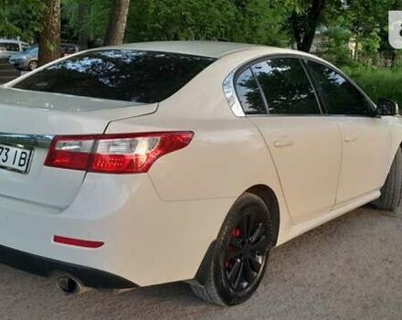 Белый Рено Латитьюд, объемом двигателя 2 л и пробегом 286 тыс. км за 8999 $, фото 1 на Automoto.ua