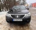 Черный Рено Латитьюд, объемом двигателя 2 л и пробегом 204 тыс. км за 6700 $, фото 1 на Automoto.ua
