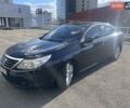 Черный Рено Латитьюд, объемом двигателя 2 л и пробегом 293 тыс. км за 5700 $, фото 1 на Automoto.ua