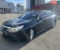 Черный Рено Латитьюд, объемом двигателя 2 л и пробегом 293 тыс. км за 5500 $, фото 1 на Automoto.ua