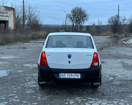 Білий Рено Логан, об'ємом двигуна 1.4 л та пробігом 300 тис. км за 1699 $, фото 4 на Automoto.ua