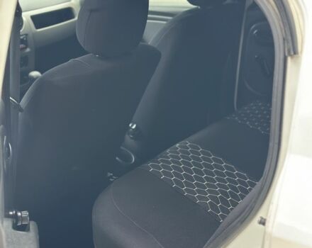 Білий Рено Логан, об'ємом двигуна 1.4 л та пробігом 387 тис. км за 2499 $, фото 10 на Automoto.ua