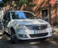 Білий Рено Логан, об'ємом двигуна 1.39 л та пробігом 450 тис. км за 3600 $, фото 1 на Automoto.ua