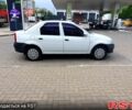 Белый Рено Логан, объемом двигателя 1.4 л и пробегом 289 тыс. км за 3750 $, фото 1 на Automoto.ua