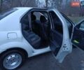Белый Рено Логан, объемом двигателя 1.4 л и пробегом 118 тыс. км за 4500 $, фото 3 на Automoto.ua