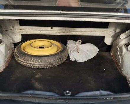 Білий Рено Логан, об'ємом двигуна 1.39 л та пробігом 670 тис. км за 1750 $, фото 14 на Automoto.ua