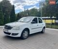 Белый Рено Логан, объемом двигателя 1.4 л и пробегом 230 тыс. км за 2999 $, фото 1 на Automoto.ua