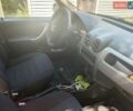 Белый Рено Логан, объемом двигателя 1.39 л и пробегом 270 тыс. км за 3500 $, фото 1 на Automoto.ua