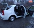 Белый Рено Логан, объемом двигателя 1.4 л и пробегом 118 тыс. км за 4500 $, фото 1 на Automoto.ua