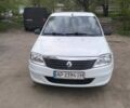 Білий Рено Логан, об'ємом двигуна 1.39 л та пробігом 300 тис. км за 3300 $, фото 1 на Automoto.ua