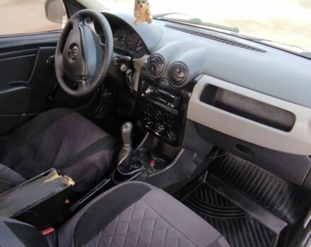 Белый Рено Логан, объемом двигателя 1.4 л и пробегом 670 тыс. км за 1750 $, фото 6 на Automoto.ua