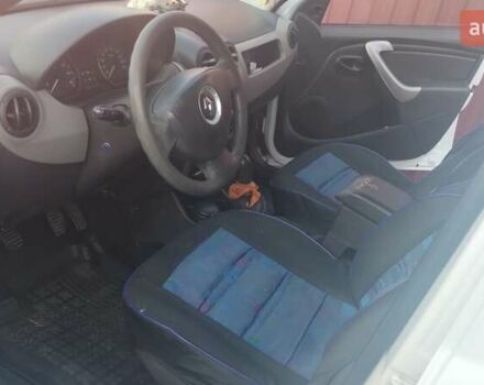 Белый Рено Логан, объемом двигателя 1.4 л и пробегом 333 тыс. км за 3900 $, фото 2 на Automoto.ua