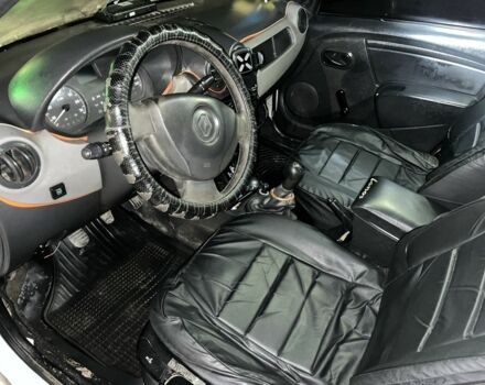 Белый Рено Логан, объемом двигателя 1.4 л и пробегом 2 тыс. км за 3500 $, фото 5 на Automoto.ua