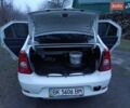Белый Рено Логан, объемом двигателя 1.4 л и пробегом 118 тыс. км за 4500 $, фото 4 на Automoto.ua