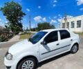 Белый Рено Логан, объемом двигателя 1.39 л и пробегом 260 тыс. км за 3300 $, фото 1 на Automoto.ua