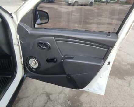 Білий Рено Логан, об'ємом двигуна 1.39 л та пробігом 670 тис. км за 1750 $, фото 8 на Automoto.ua