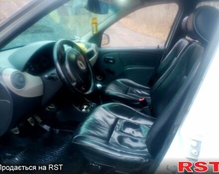 Білий Рено Логан, об'ємом двигуна 1.4 л та пробігом 400 тис. км за 2100 $, фото 3 на Automoto.ua