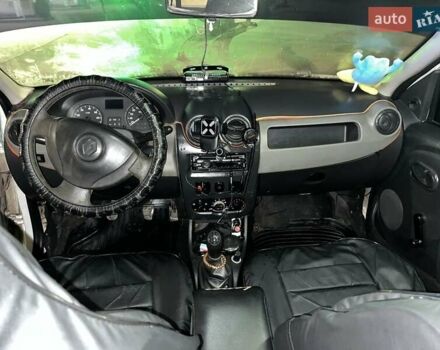 Белый Рено Логан, объемом двигателя 1.4 л и пробегом 349 тыс. км за 3500 $, фото 5 на Automoto.ua