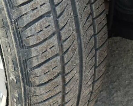 Білий Рено Логан, об'ємом двигуна 1.39 л та пробігом 670 тис. км за 1750 $, фото 12 на Automoto.ua