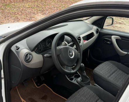 Білий Рено Логан, об'ємом двигуна 1.39 л та пробігом 211 тис. км за 2900 $, фото 9 на Automoto.ua